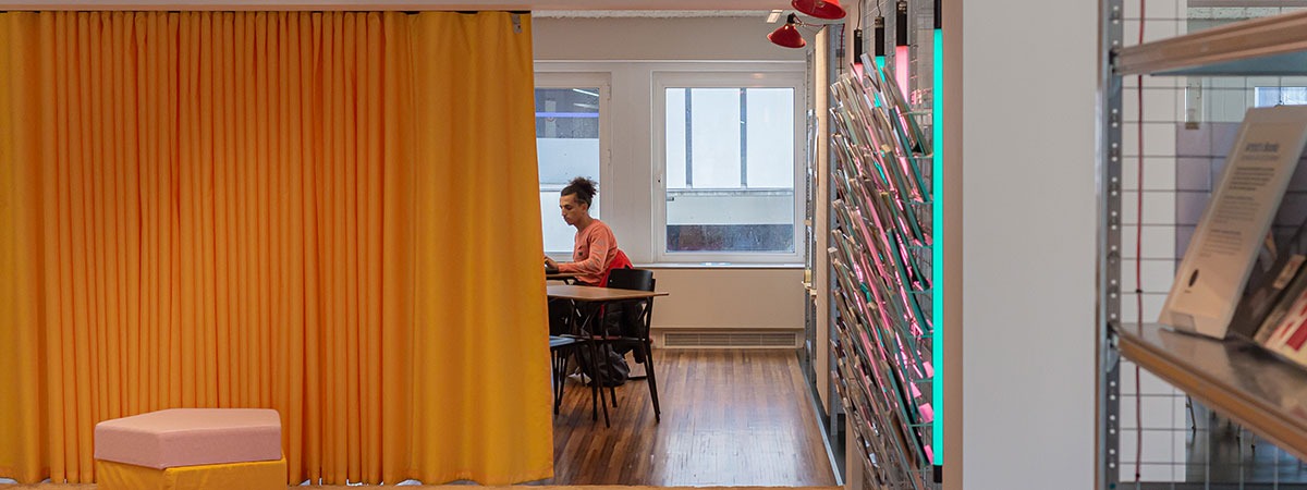 Yellow Spinnaker partition drapes for the Muntpunt Library