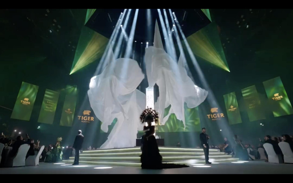 Front projection screens, translucent fabrics and reveal systems for launch event