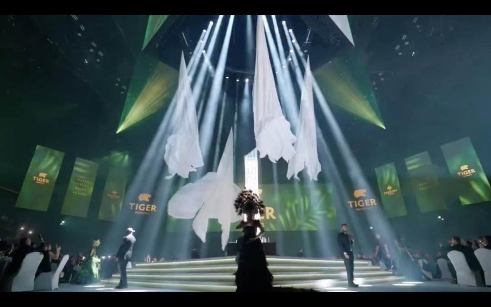 Front projection screens, translucent fabrics and reveal systems for launch event
